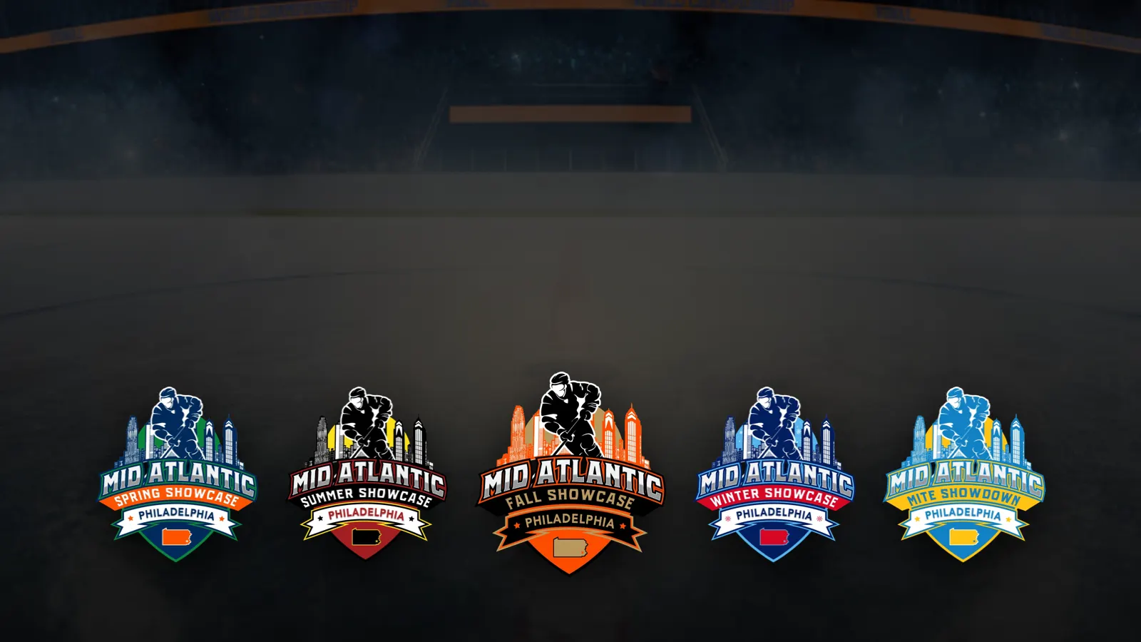 The five Mid-Atlantic Showcase Series tournament crests on the ice