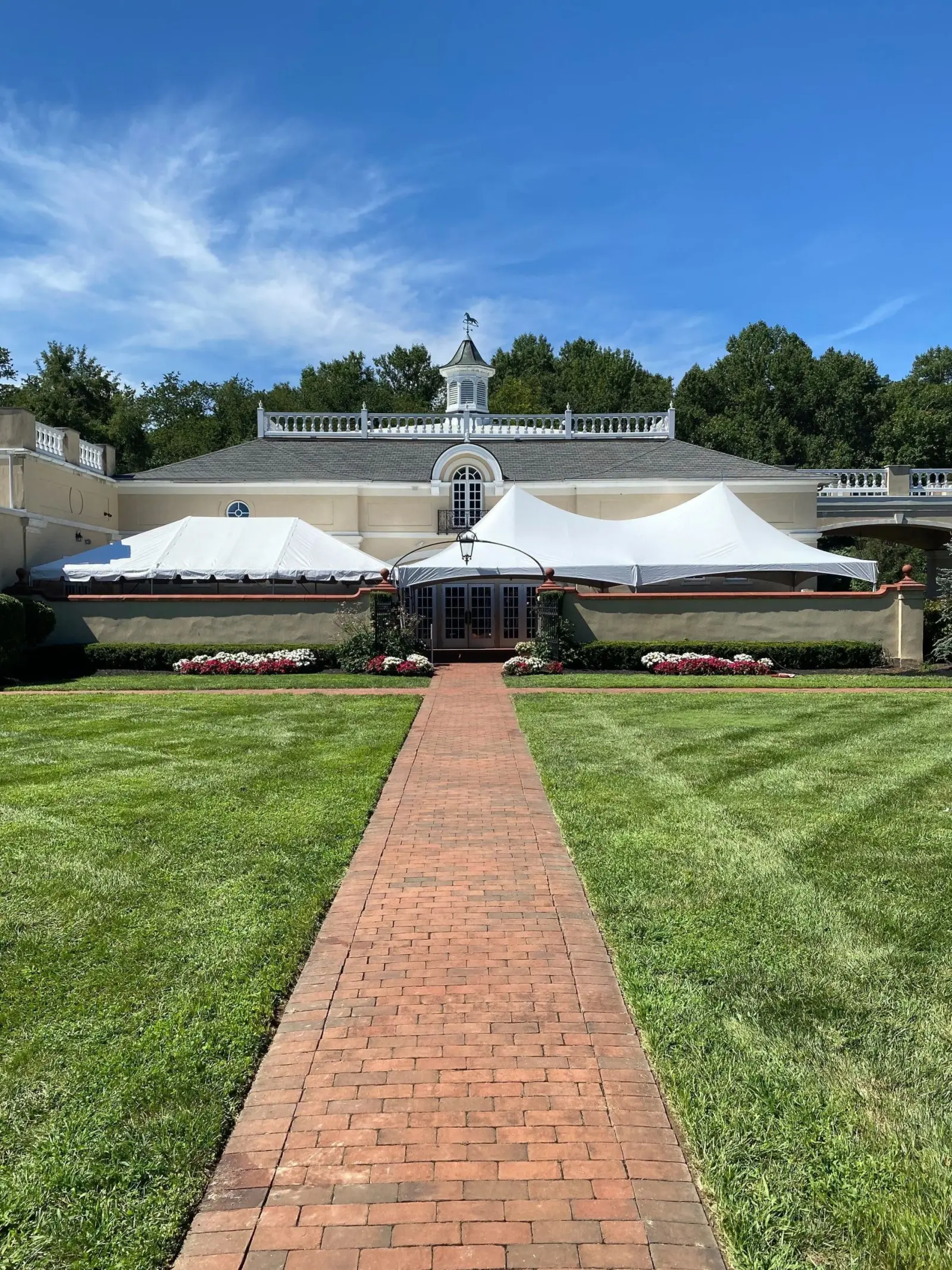 Peak Party Rentals frame tents at an equestrian estate event